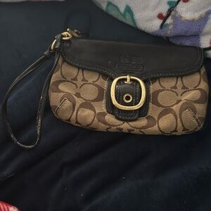 Coach used brown/black wristlet